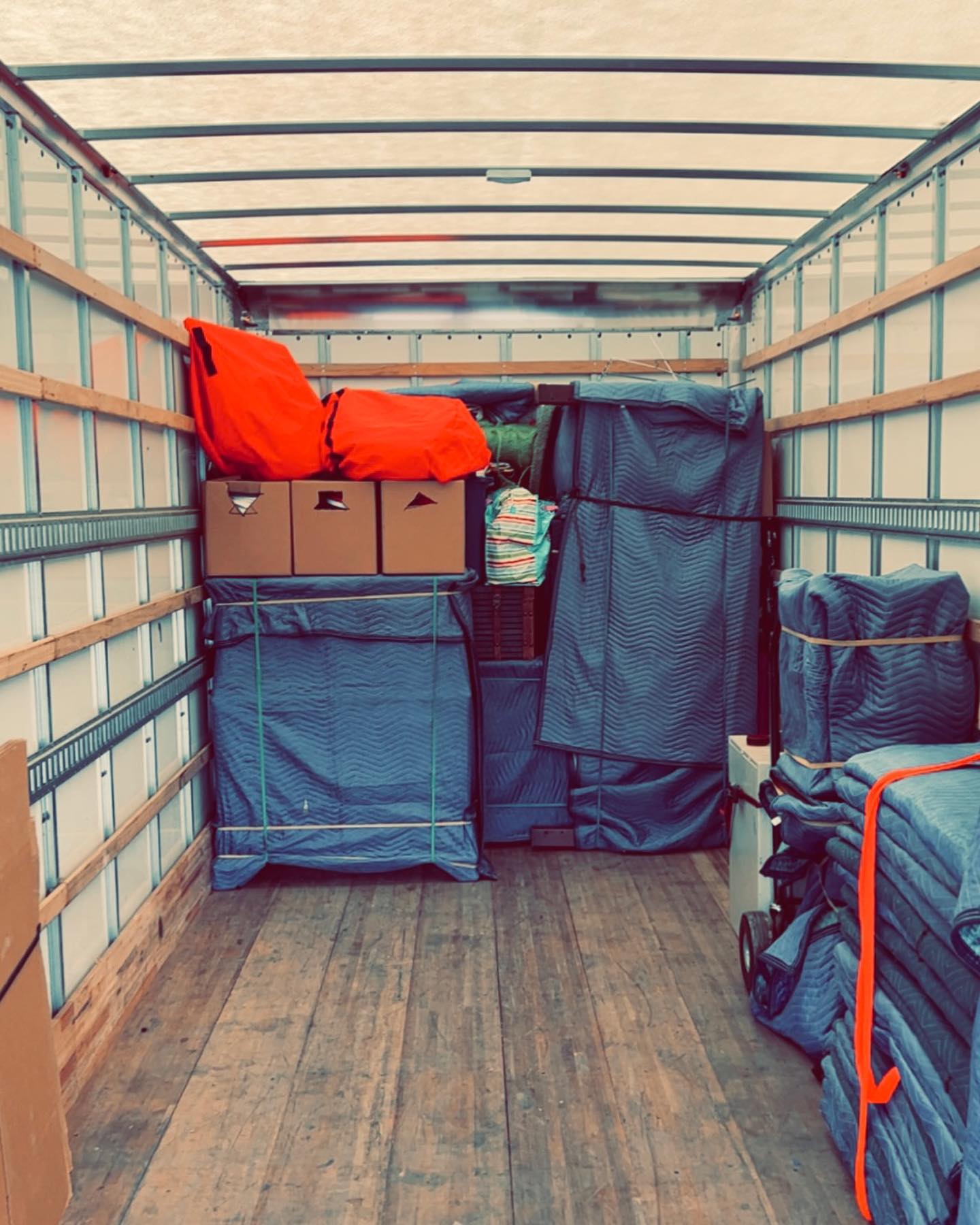 Furniture protected with blankets inside a Better Choice truck