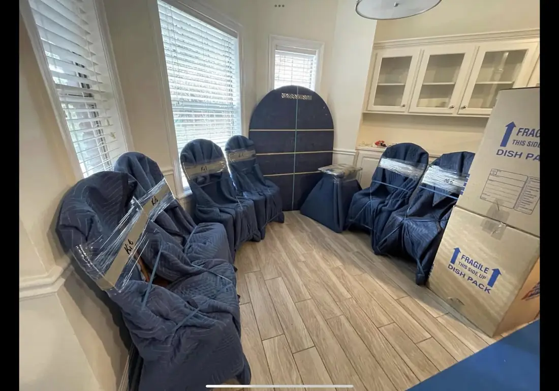 Dining chairs wrapped and dish pack boxes ready to move, Better Choice Moving packing checklist, Quakertown, PA